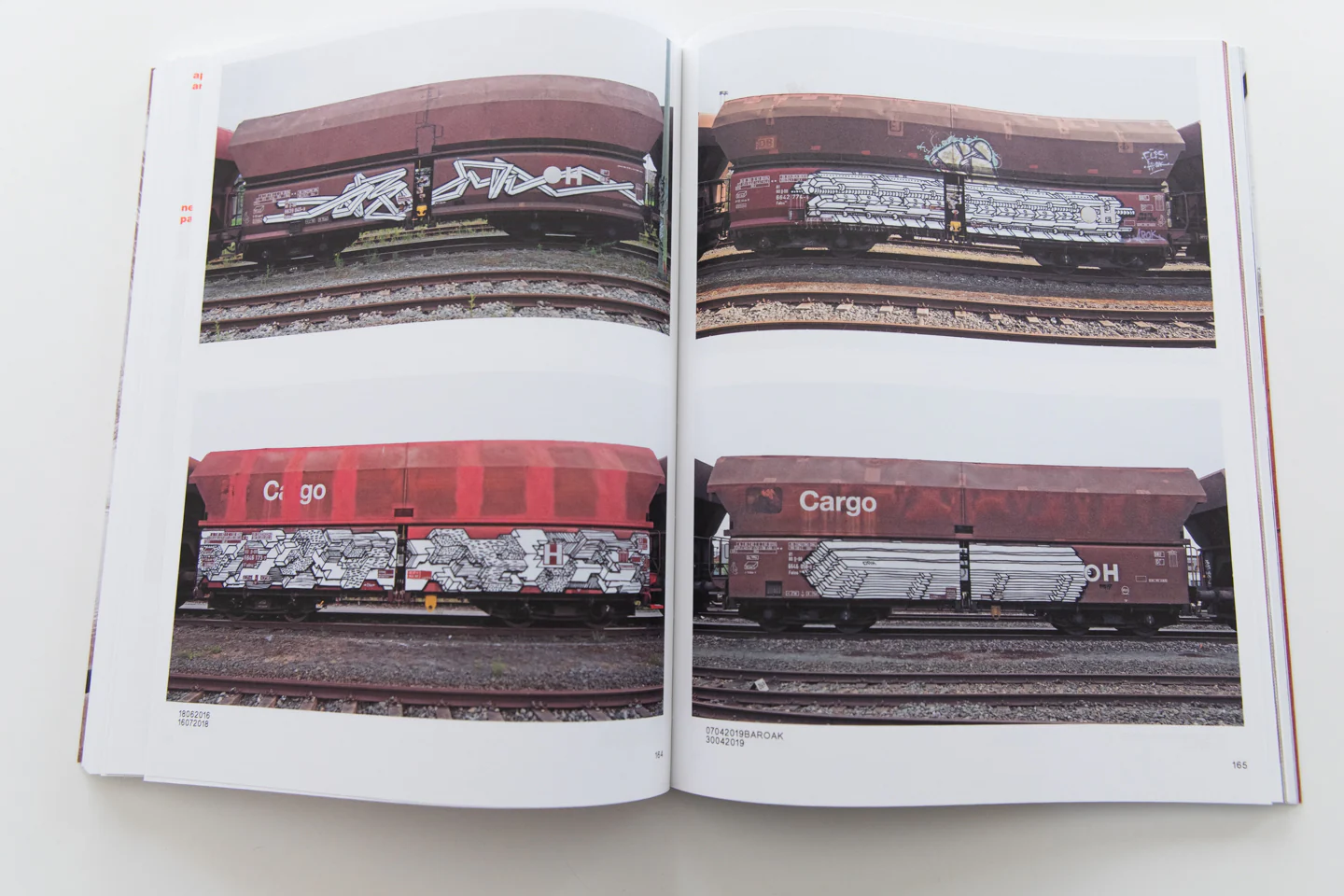 121/183 761 PHOTOS OF RED-BROWN STEEL FREIGHT WAGONS WITH A PAINTING ON THE SIDE - Image 3